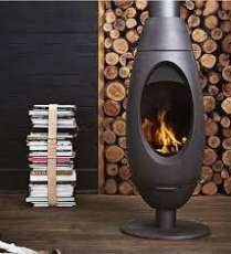 Печь-камин Invicta OVE стальная в интерьере Амазонка бай фото в Орше