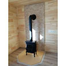 Чугунный камин со стеклом Сибирь 7 фото в интерьере в Орше