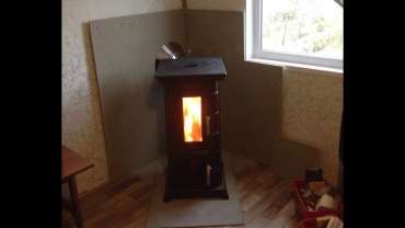 Отопительная печь Термофор Статика Тетра, чёрная бронза фото в интерьере в Орше