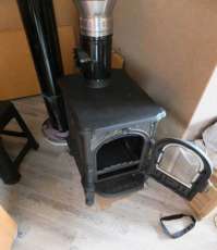 Недорогой печь-камин со стеклом Сибирь 6 фото в интерьере в Орше