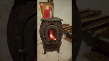 Печь отопительно-варочная чугунная "Сибирь" фото в интерьере в Орше