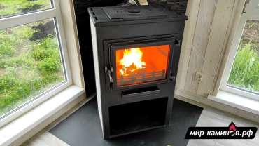 Недорогая печь-камин ЭТНА (Панорама) с плитой и теплообменником Амазонка бай фото в Орше