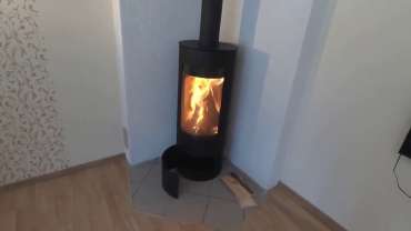 Стильная печь-камин с шамотом Мета-Бел Селигер в Орше фото в интерьере в Орше