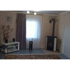 Стальной камин с шамотом Мета-Бел Ритм L фото в интерьере в Орше