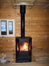 Печь-камин Бавария водяной с плитой в интерьере в Орше