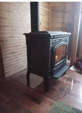 Печь-камин чугунный FireWay Gunter в интерьере чёрный Амазонка бай фото в Орше