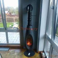 Печь-камин чугунный Invicta OVATIO в интерьере Амазонка бай фото в Орше